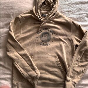 Primark Tan Pullover Hoodie with Vintage Graphic